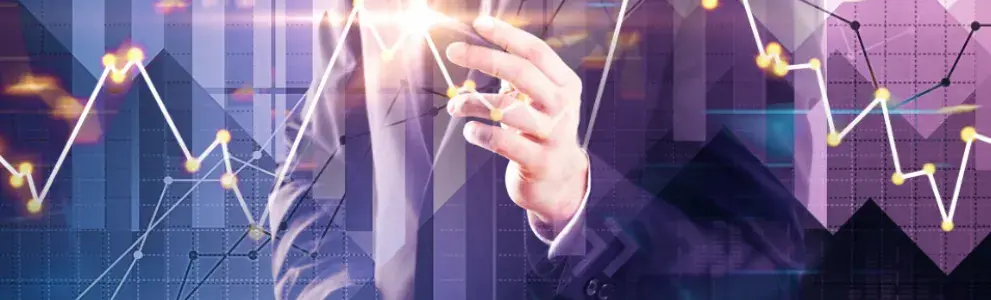 Businessman in front of a stock chart and a company chart.